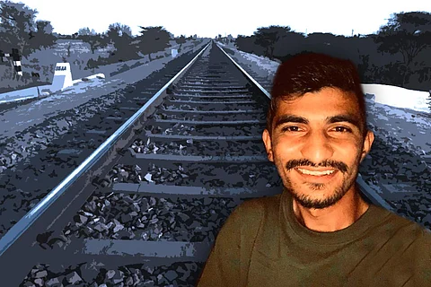 Picture of Arbaaz Mullah from Belagavi who was found dead on September 28, 2021, in the picture he is wearing an olive green t-shirt and railway track seen in the background