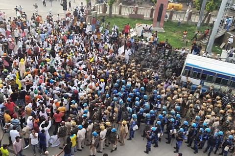 Farmers protest as part of Bharat Bandh on September 27 with security personnel on street