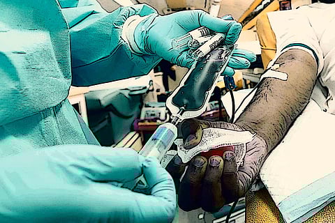 Stylised image of a person receiving blood transfusion