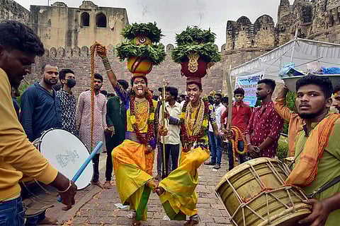 Devotees perform at Bonalu festival at Golconda fort in Hyderabad