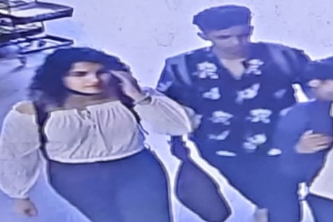 CCTV footage of the woman and her friend in the mall