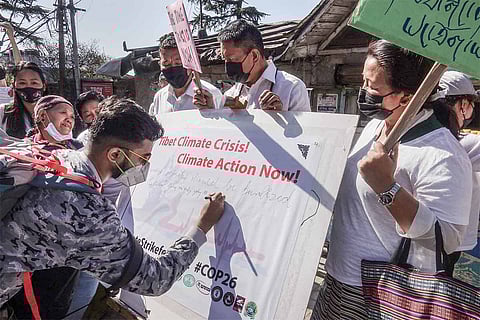 A protest in Dharamshala to highlight environmental issues in Tibet ahead of COP26