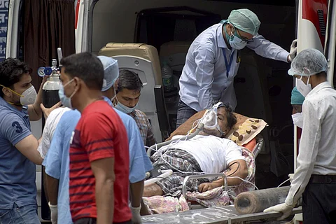 Patient with oxygen support in ambulance