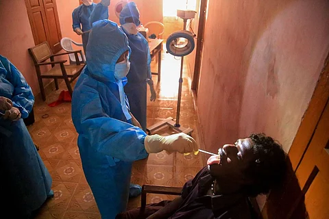 Man undergoing swab collection