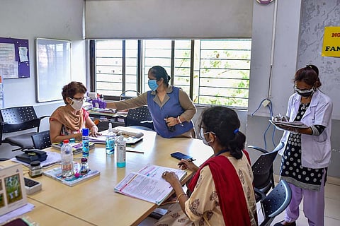 Women teachers screened for temperature