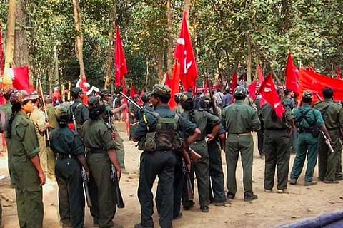 File photo of Maoists in a forest in India