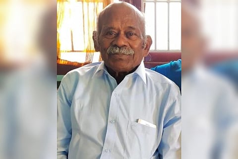 Actor Chelladurai seen wearing a white shirt in the photo.