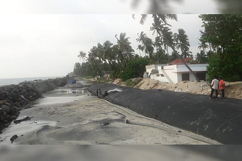 With seawall construction stalled, Kerala coastal village residents protest