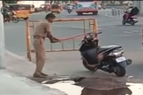Caught on camera: Chennai cop smashes two-wheeler parked on road