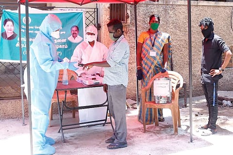 File photo of a health worker in Tamil Nadu conducting a test
