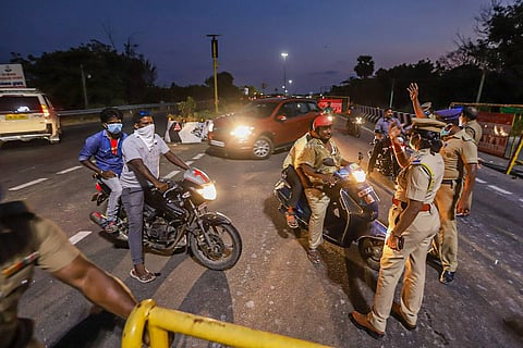 Police checking bikes during lockdown: Tamil Nadu extends COVID curbs till Jan 31, night curfew to continue
