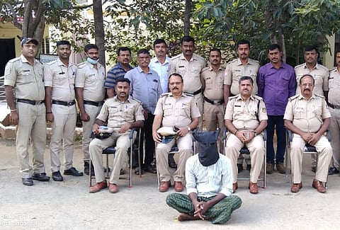 Investigators pose with necrophile who killed and raped woman in Chikkaballapura