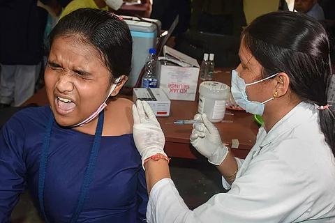 Child being vaccinated