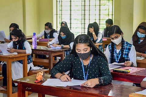 Students writing examination