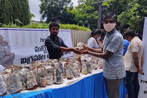 HMDA authorities distributing the idols