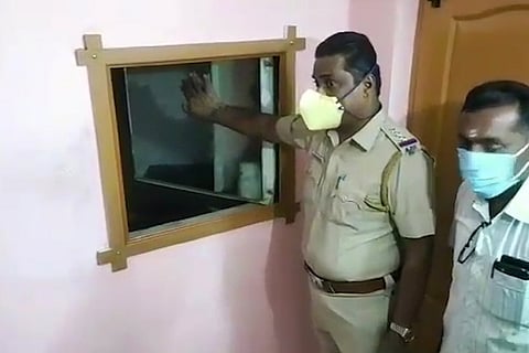 The secret room was located behind this mirroe