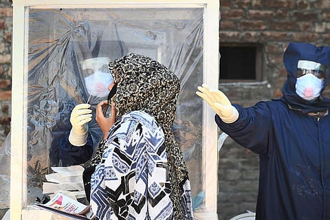 Swab samples being collected