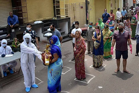 As millions face food deficit, PDS needs to look beyond income to provide provisions