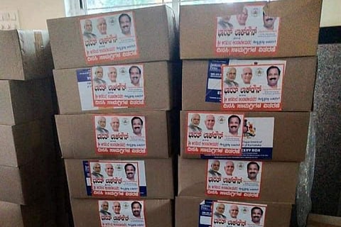 Row over BJP MLA's photo on food packets, unions say bought with workers’ fund