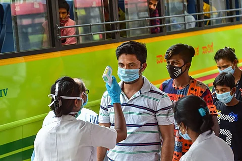 Testing for coronavirus being done at a Bengaluru bus stop