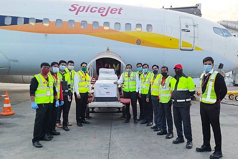 Security personnel at Hyderabad receiving Covishield