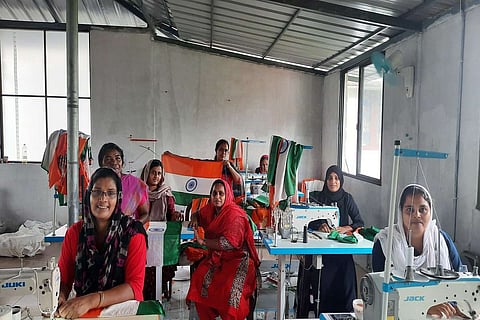 Members of the Crystal sewing unit in Peringazha at work.