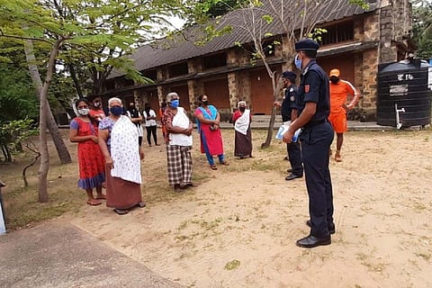 People at coasts with security officials