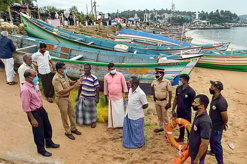 Fishermen preparing for Cyclone Burevi