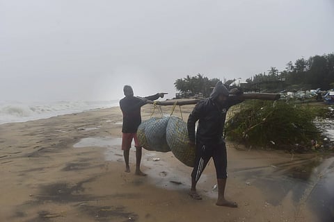 Fishermen during Cyclone Nivar