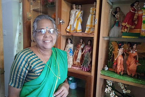 S Devaki in front of her barbie recreations