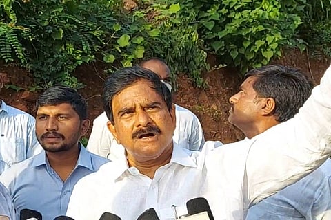 Devineni Uma addressing the media from Kondapalli forest area