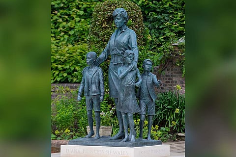 The statue of Princess Diana with three children at Kensington Palace