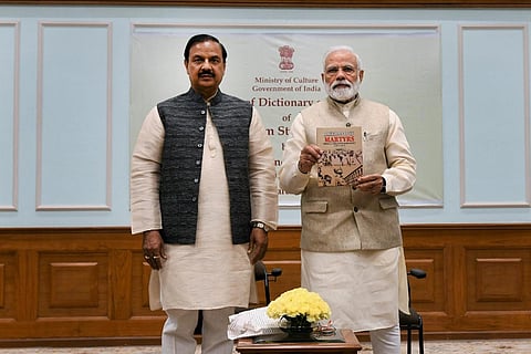 PM Modi releasing 'Dictionary of Martyrs' in 2019