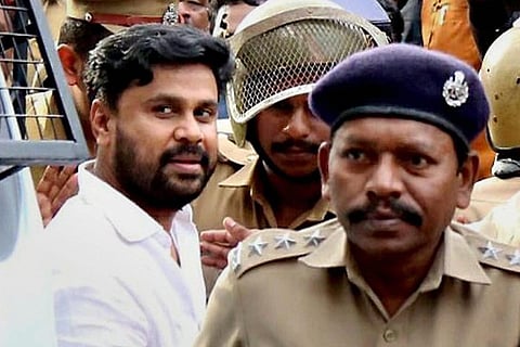 Dileep with policemen