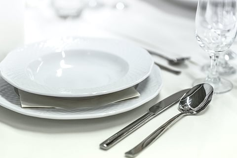 Cutlery laid out in a restaurant