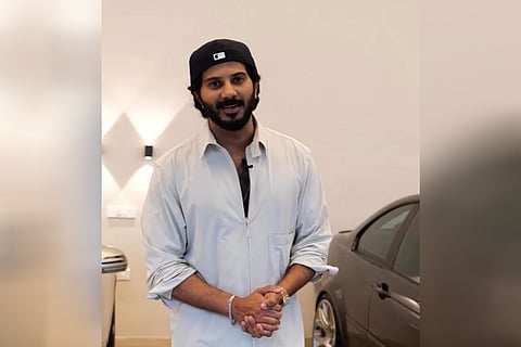 Dulquer Salmaan in a recent Instagram reel sharing glimpses of his car collection