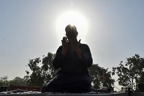 Man offering Eid prayers