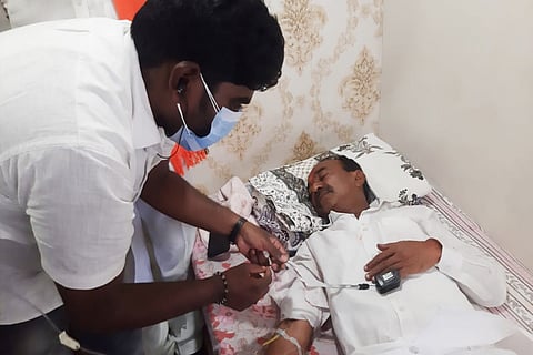 Doctor examining Eatala Rajender