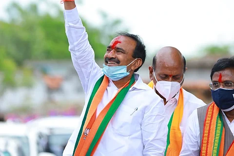 Eatala Rajender waving at the crowd