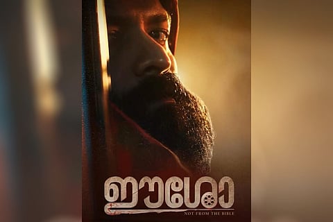 Actor Jayasurya is seen sporting a mysterious look in a beard and hoodie in the poster of 'Eesho'