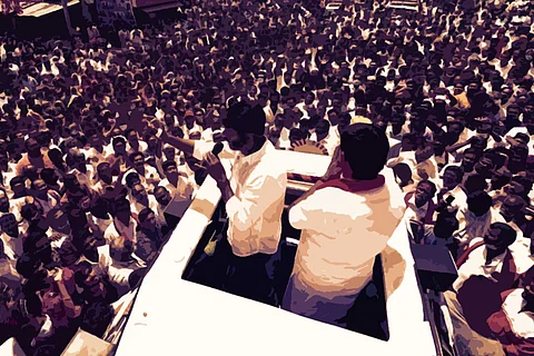A politician speaking to a big crowd of people