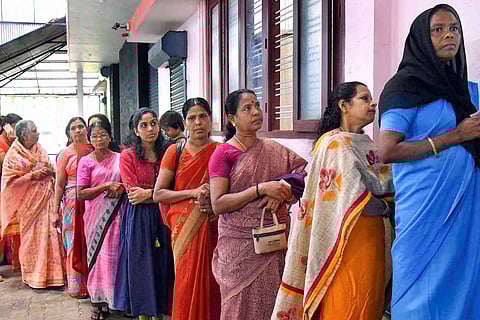 Voters standing in a queue