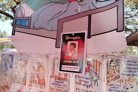 An obituary poster with Harshita’s photo at the protest site