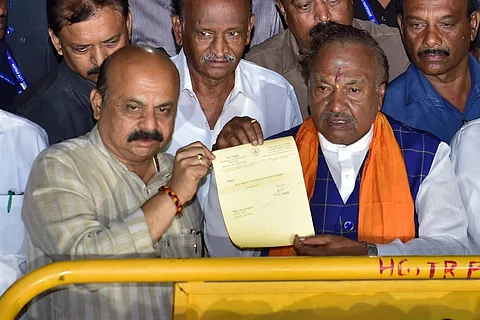 Eshwarappa handing over his resignation to Chief Minister Basavaraj Bommai amid the controversy on contractor Santhosh Patil's death