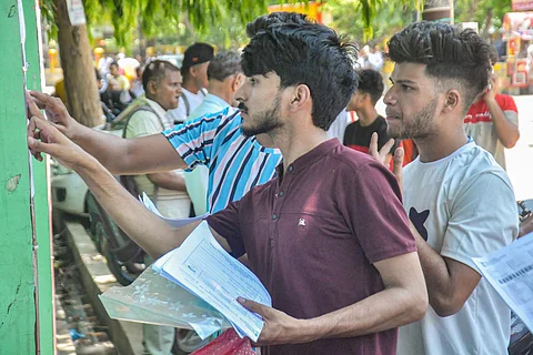 NEET-UG results 2022: Candidates checking a notice board