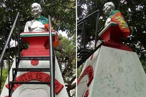 BJP flag draped around Gandhi statue