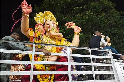 Ganesh idol being transported for immersion