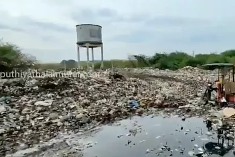 Garbage dumped in porur lake