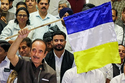 Ghulam Nabi Azad waving his party flag