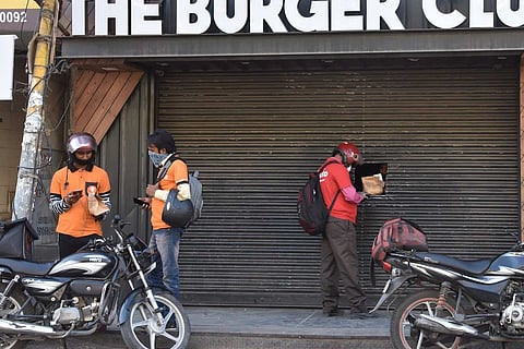 Swiggy and Zomato delivery personnel